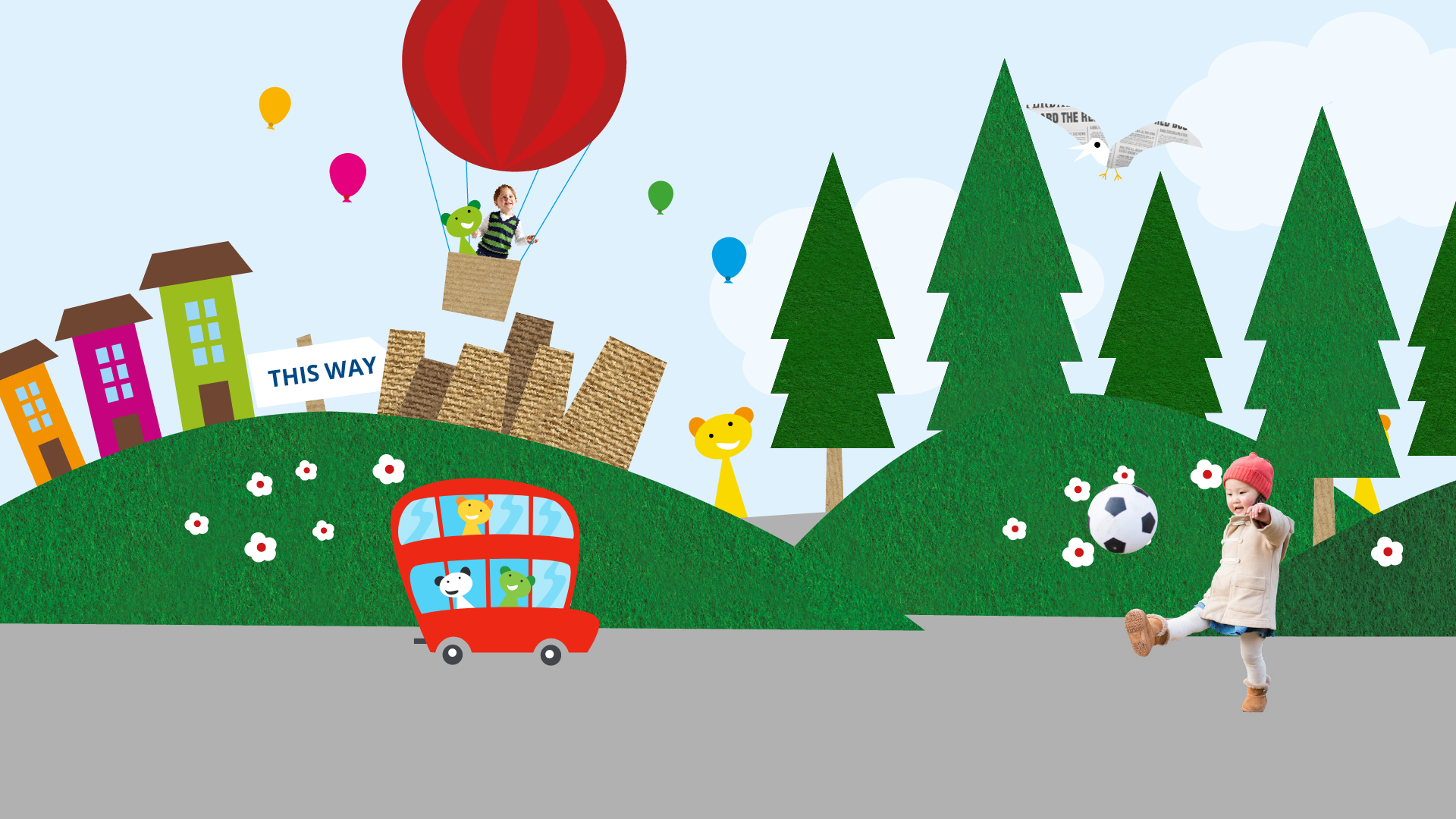 Redbus Nursery - Zoomed in section of hero image showing a bright red bus moving along a cartoon road with large rolling green hills and a photo of a girl kicking a football